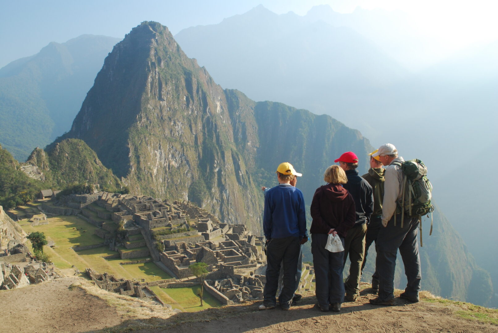 luxury family vacations: Family visiting Machu Picchu, Peru